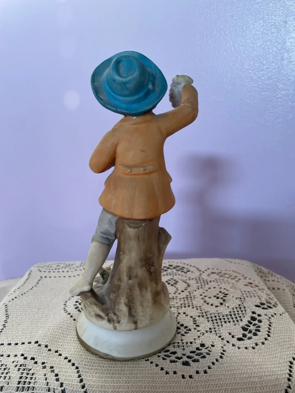 Blue-Hat Boy Figurine Porcelain Home Accent holding grapes